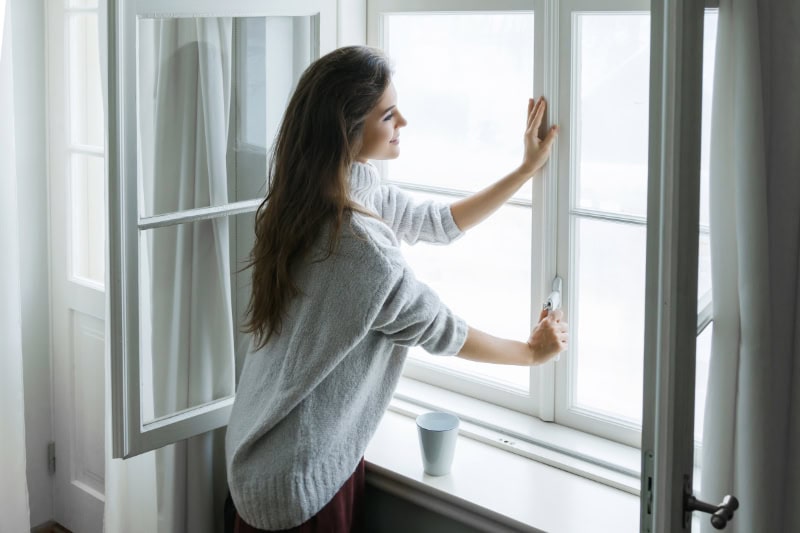 What we shoul dknow about air handlers. Women at window.