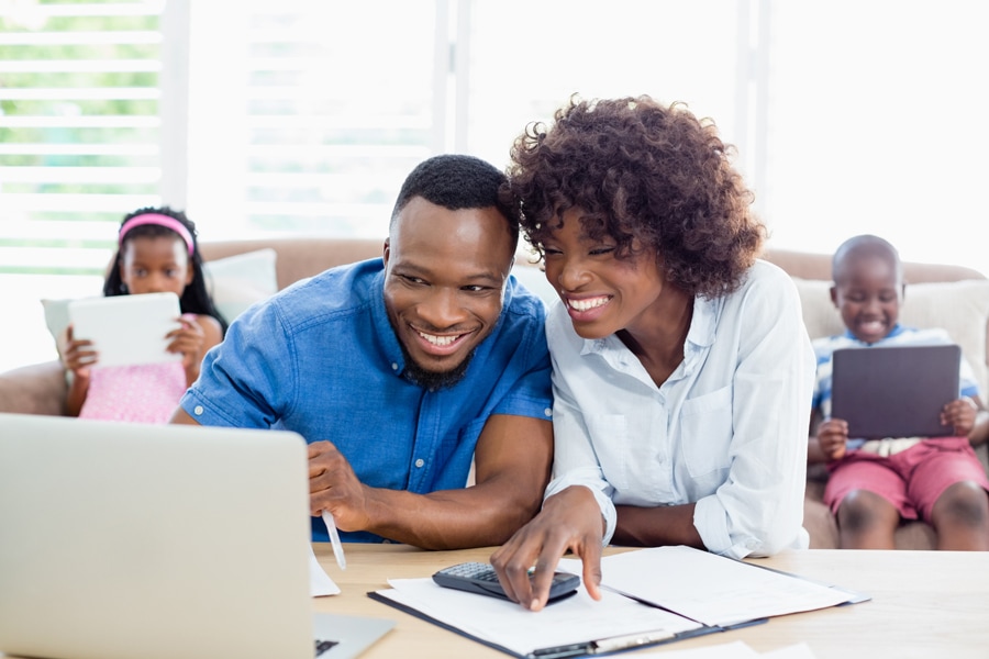 Couple on their computer.